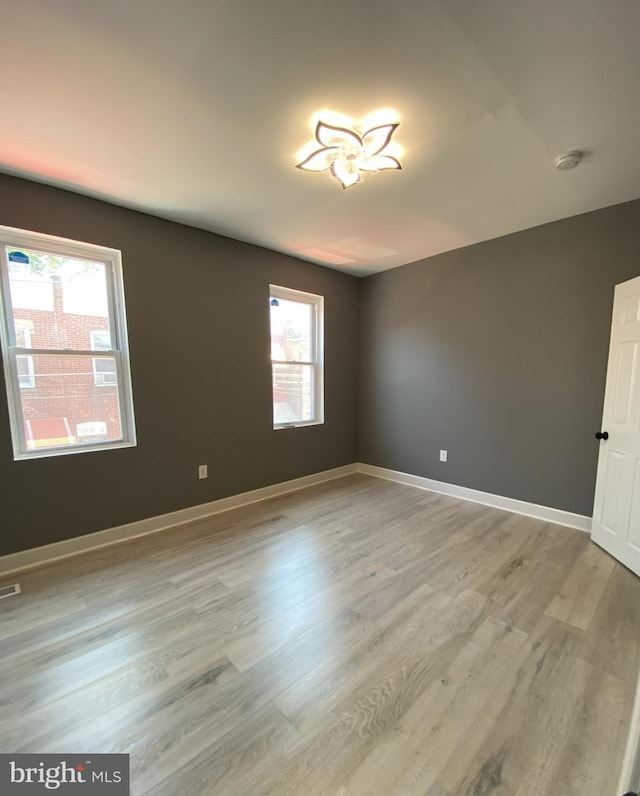 1636 Fillmore St, Philadelphia, PA 19124 - unfurnished room with light wood-style flooring, visible vents, and baseboards