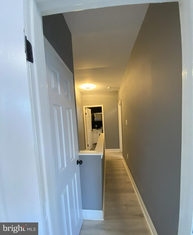 hall featuring light hardwood / wood-style flooring