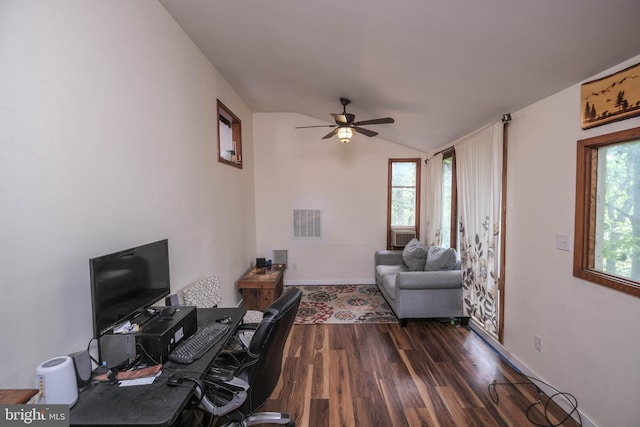 office area featuring lofted ceiling, dark wood-type flooring, and ceiling fan