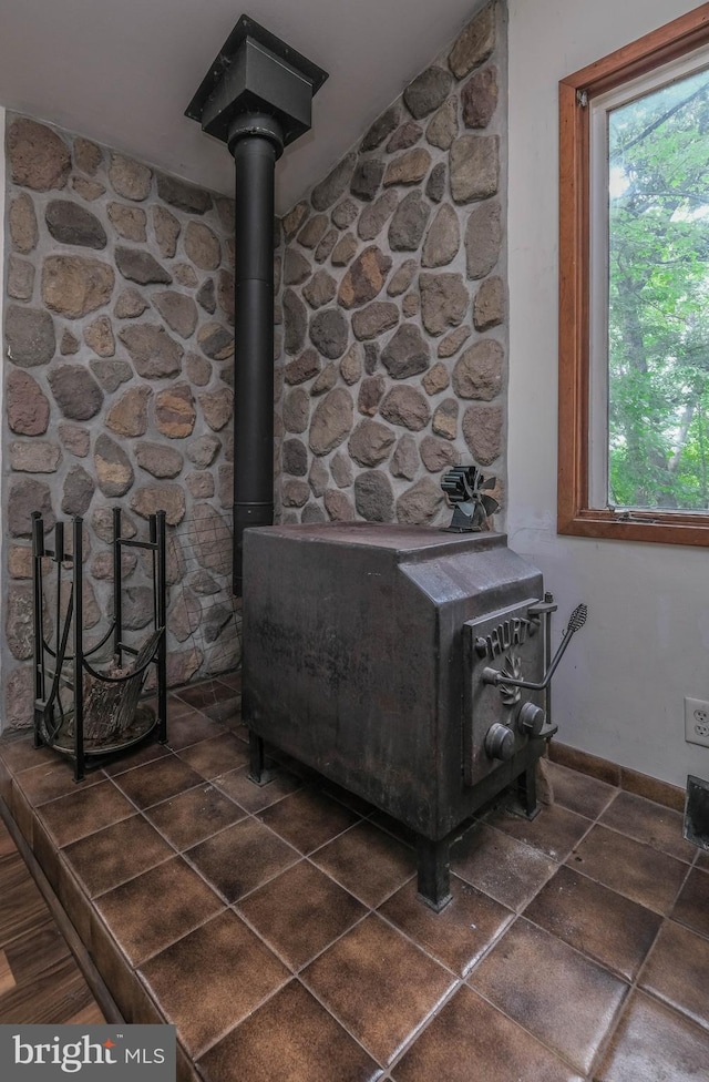 interior details featuring a wood stove