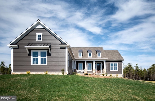 view of front of property with a front lawn and a porch