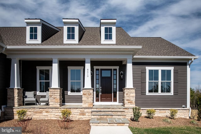 view of front of property featuring covered porch