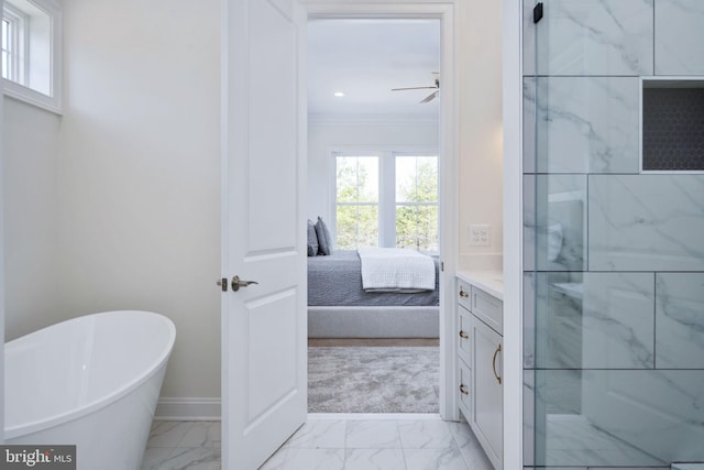 bathroom with a tub to relax in, ornamental molding, tile patterned floors, vanity, and ceiling fan