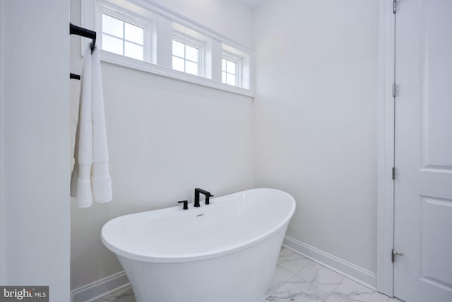 bathroom with a tub