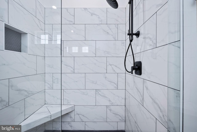 room details with a tile shower