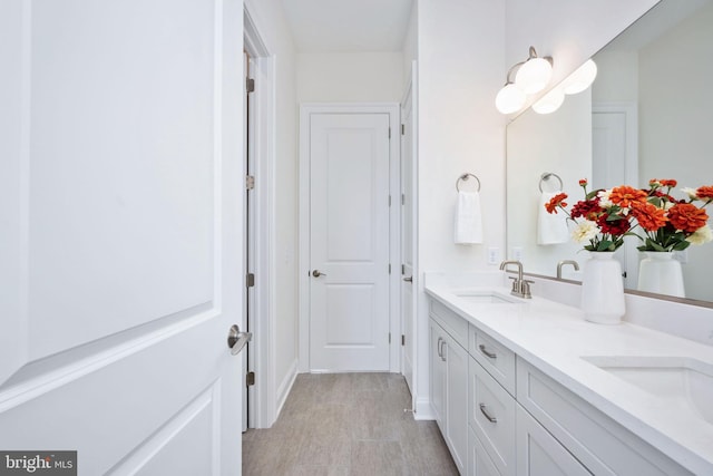 bathroom featuring double vanity