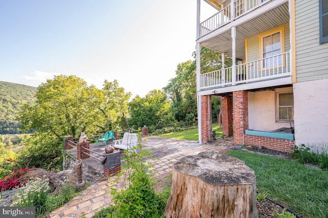 view of patio / terrace featuring a balcony