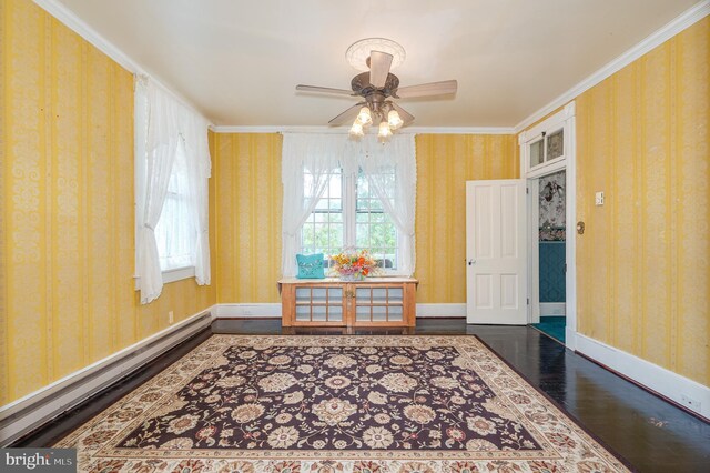 dining area with ornamental molding, baseboard heating, hardwood / wood-style flooring, and ceiling fan