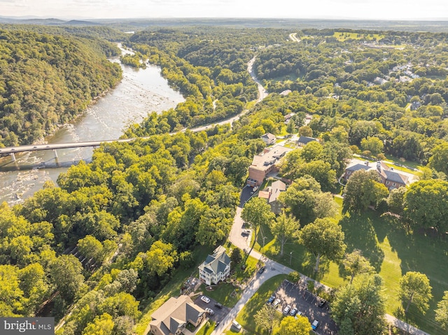 bird's eye view featuring a forest view