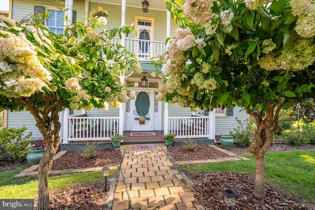 exterior space featuring covered porch