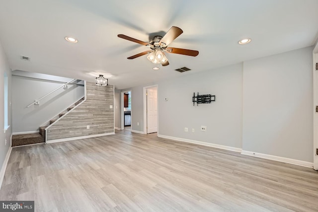 unfurnished living room with light hardwood / wood-style floors and ceiling fan