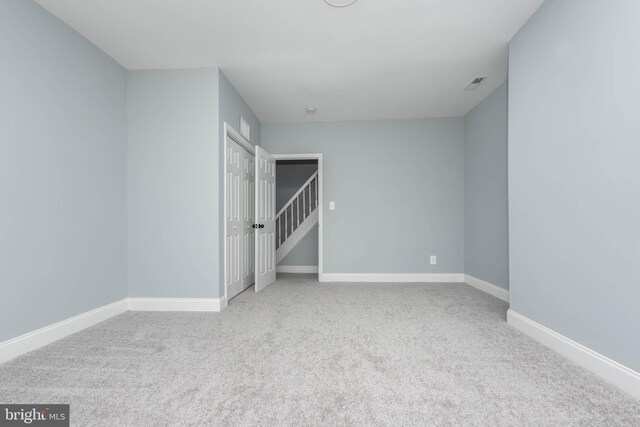 unfurnished bedroom featuring carpet flooring