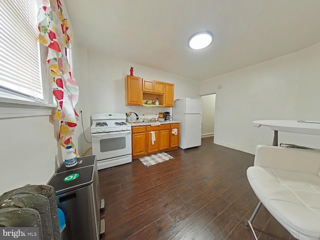 kitchen featuring white appliances, dark wood finished floors, brown cabinets, light countertops, and open shelves