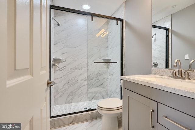 bathroom featuring tile patterned flooring, an enclosed shower, toilet, and vanity