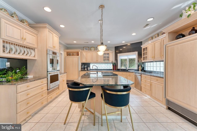 kitchen featuring appliances with stainless steel finishes, ornamental molding, and light brown cabinetry