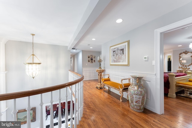 hall with wood-type flooring