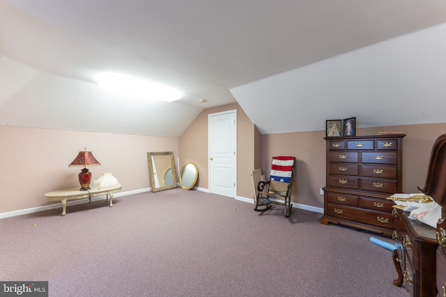 living area featuring lofted ceiling and carpet flooring