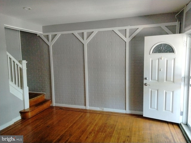 entrance foyer featuring wood-type flooring