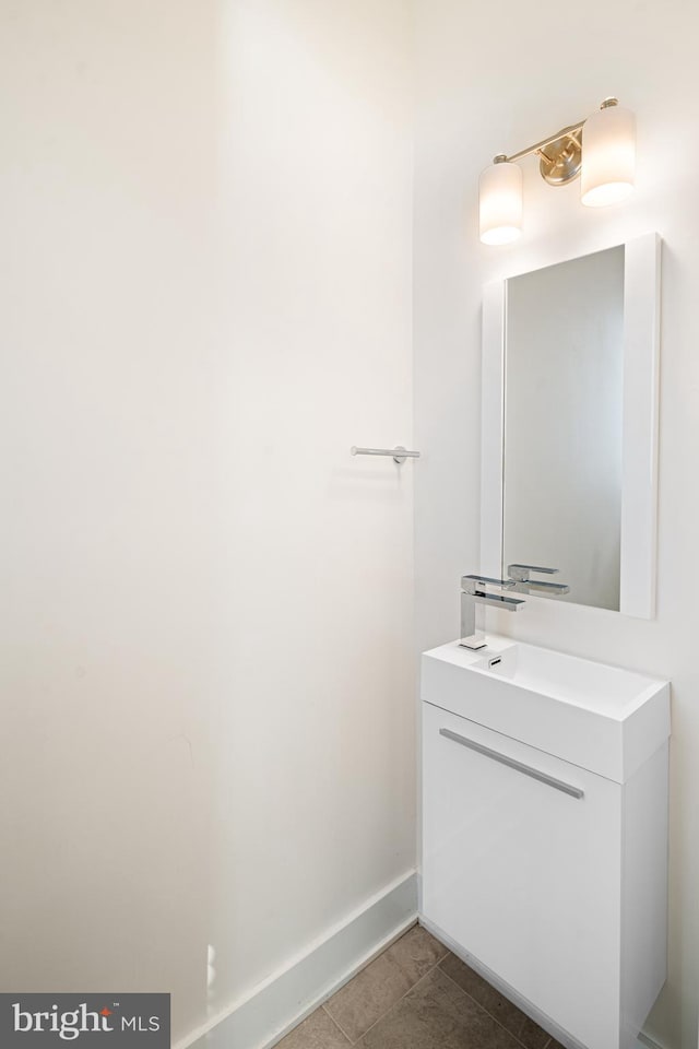 bathroom with vanity and tile patterned floors