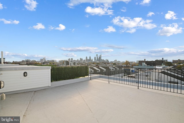 view of patio with a balcony