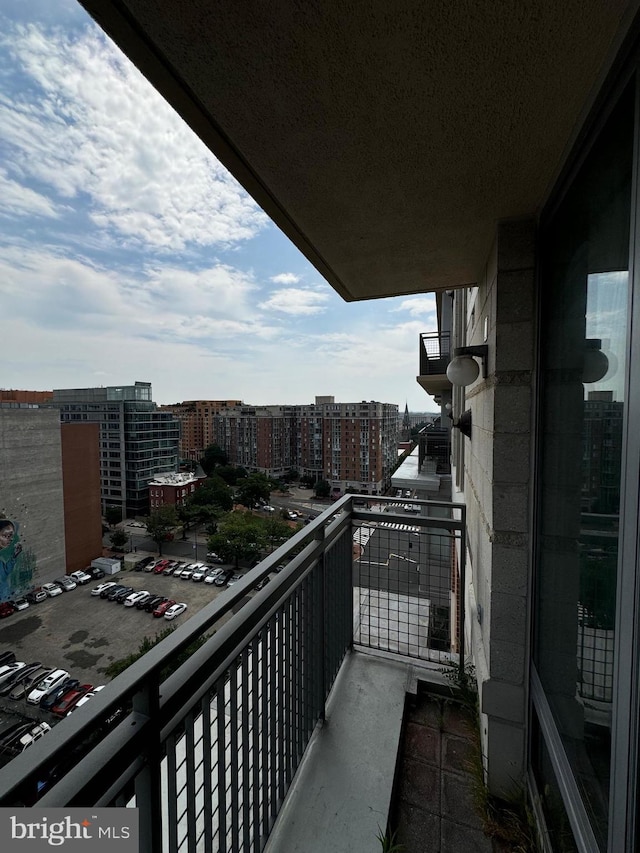 balcony featuring a city view