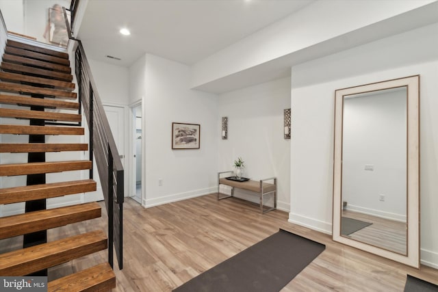 interior space with hardwood / wood-style floors