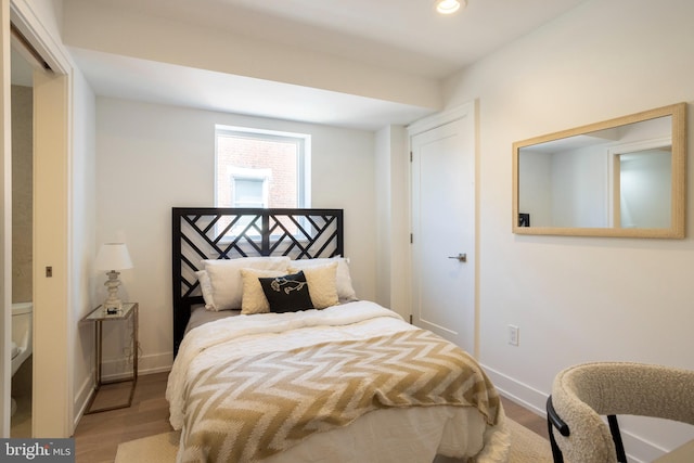 bedroom featuring hardwood / wood-style flooring