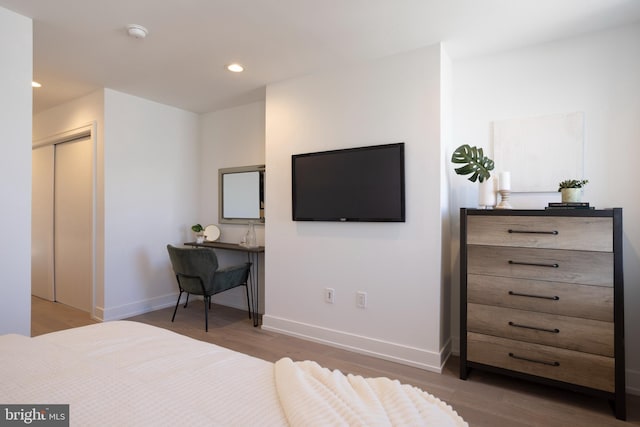 bedroom featuring hardwood / wood-style flooring