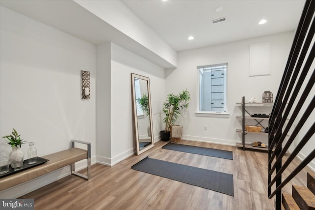 entryway with light hardwood / wood-style flooring