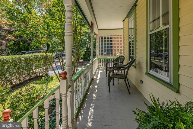 balcony featuring a porch