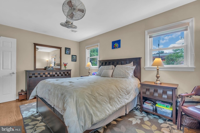 bedroom featuring wood finished floors