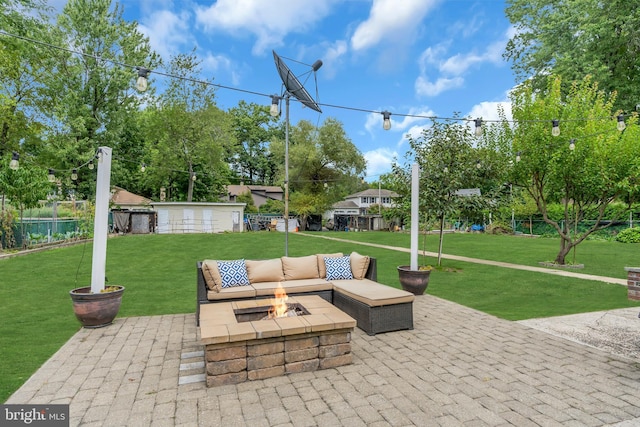 view of patio / terrace with fence and an outdoor fire pit