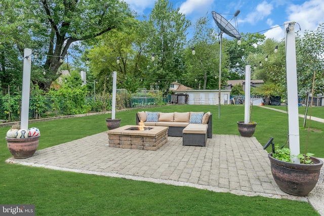 view of patio / terrace featuring fence and an outdoor fire pit