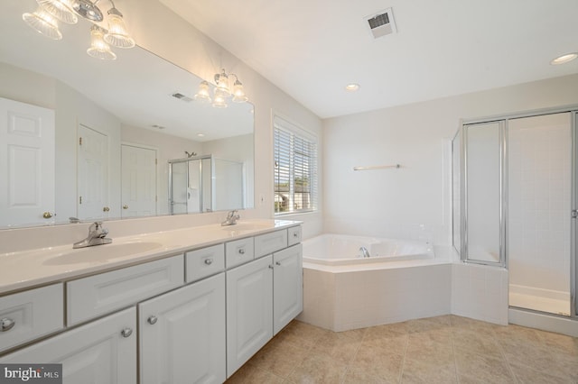 bathroom with a garden tub, a sink, visible vents, tile patterned floors, and a stall shower