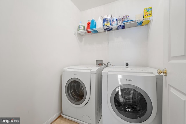 laundry room with washer and clothes dryer