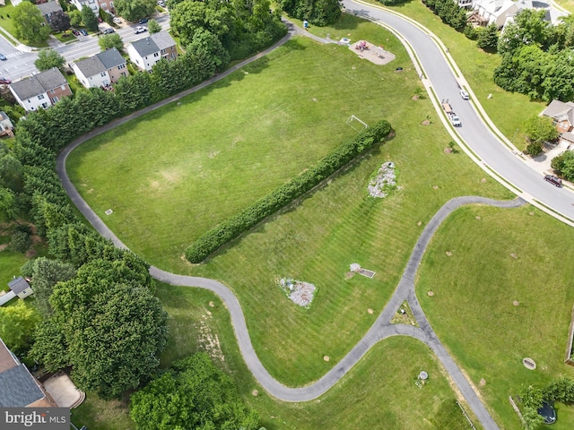 birds eye view of property with a residential view