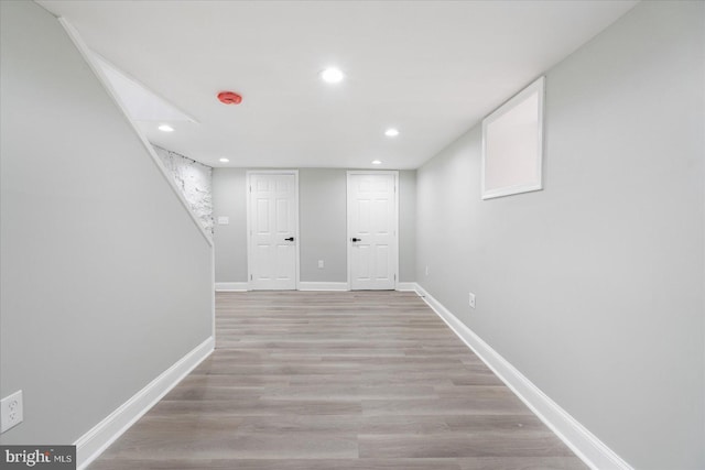 basement with light wood-type flooring