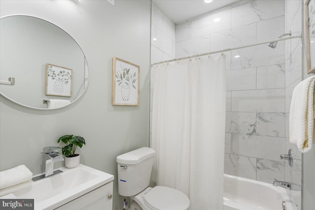 full bathroom with sink, toilet, and shower / bath combo with shower curtain