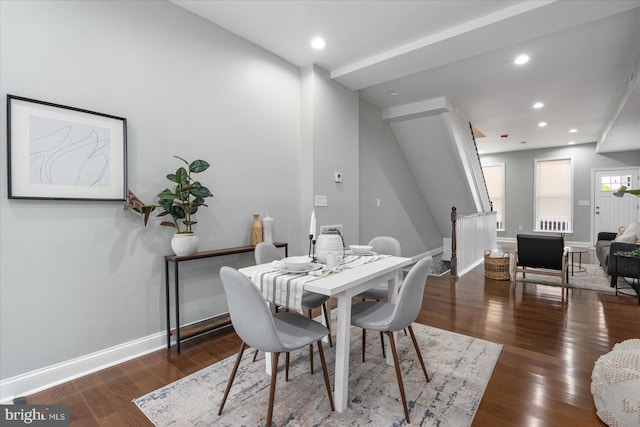 dining area with dark hardwood / wood-style floors