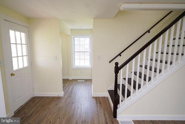 entrance foyer featuring hardwood / wood-style floors