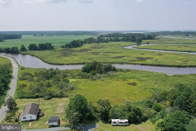 bird's eye view featuring a rural view and a water view