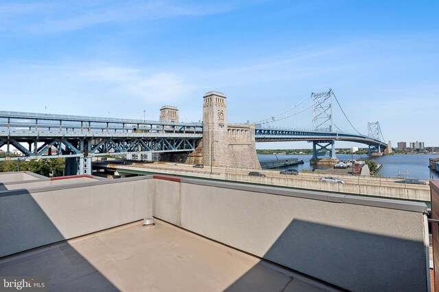 view of patio / terrace featuring a water view