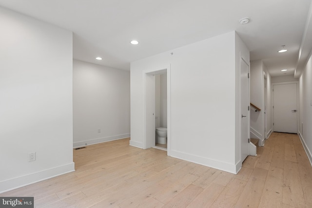 unfurnished room featuring light hardwood / wood-style flooring