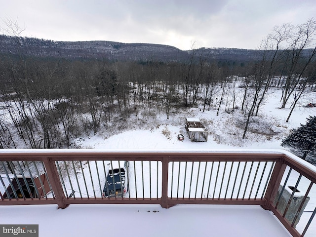 view of snow covered deck