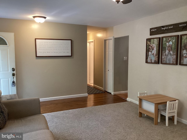 living room featuring dark hardwood / wood-style floors