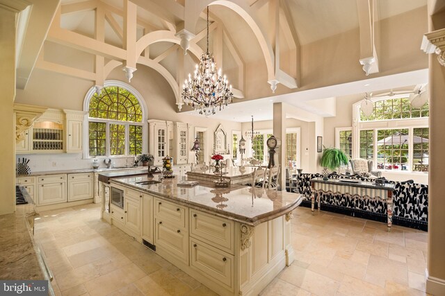 kitchen with sink, stainless steel appliances, plenty of natural light, and tasteful backsplash