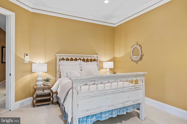 carpeted bedroom featuring ornamental molding