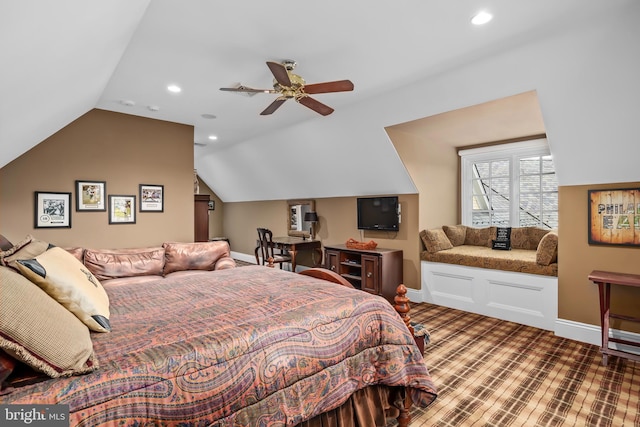 bedroom with ceiling fan and lofted ceiling