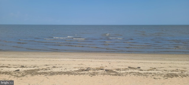 view of water feature with a beach view