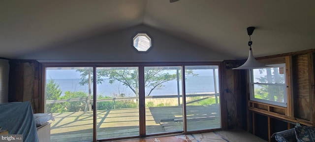 entryway featuring vaulted ceiling and a water view